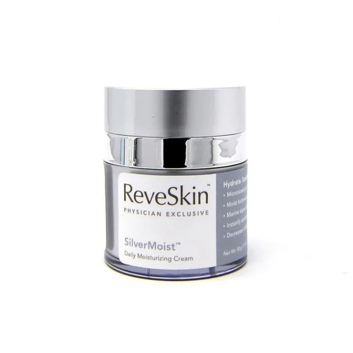 ReveSkin SilverMoist Daily Moisturizing Cream is presented in a sleek, silver and white jar. This physician-exclusive skincare product is designed to hydrate and rejuvenate the skin. It features micro-nutrients and marine extracts that help boost moisture levels, providing instant hydration and a smoother complexion. The cream is suitable for daily use and aims to decrease dryness while enhancing skin texture. Perfect for those seeking a high-quality moisturizer, ReveSkin SilverMoist is a premium choice for achieving healthy, radiant skin